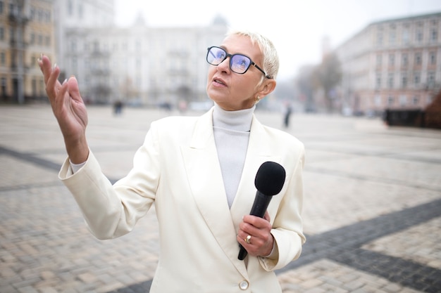 Close up on reporter preparing for an interview