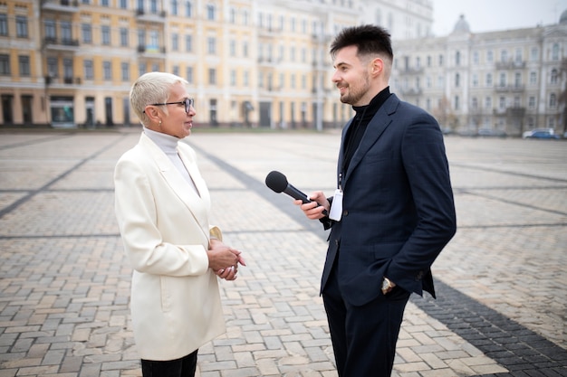 Close up on reporter taking an interview