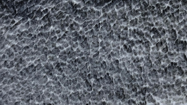 A close up of a rough textured surface