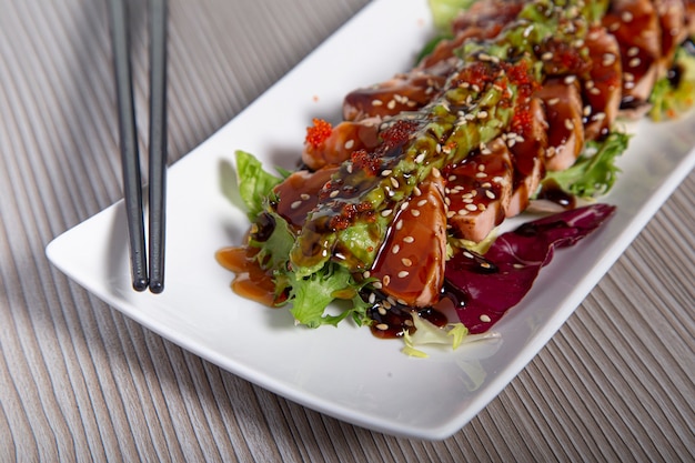 Close-up of Salmon Tataki Japanese food salmon fillet. Selective focus