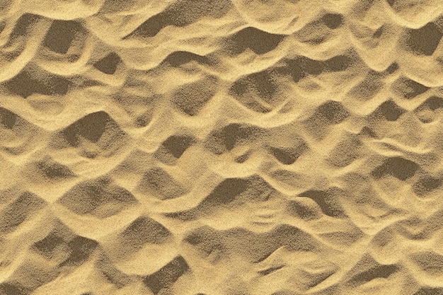 Photo close up of a sand dune with a pattern of footprints