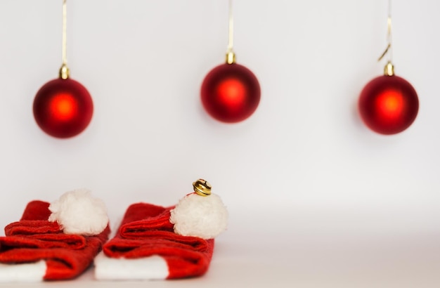 Close up of santa claus hat and red decor