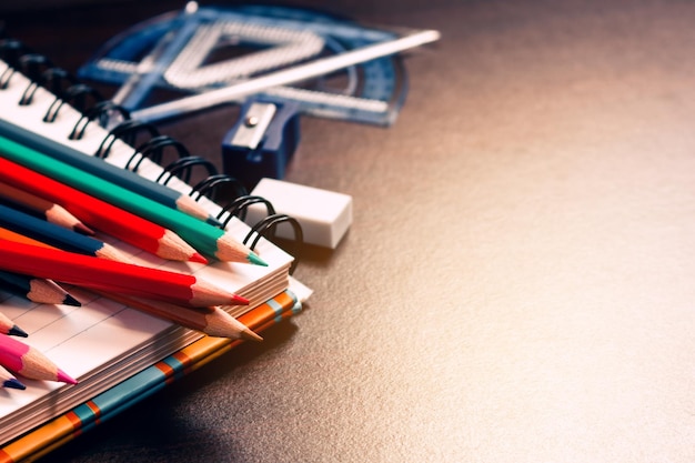 Close-up of school supplies on table