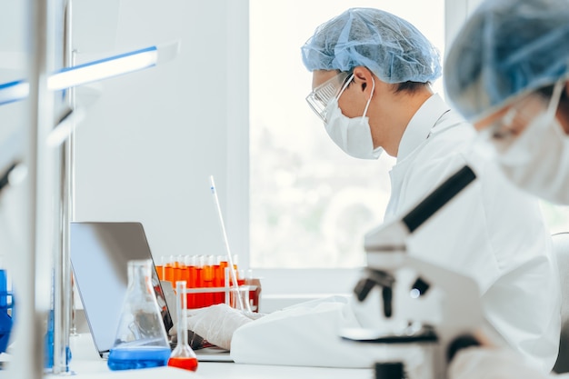 Close up. scientist using a microscope in the laboratory. photo with a copy-space.