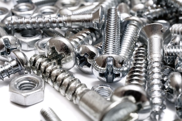 Close-up of screws and nuts on table