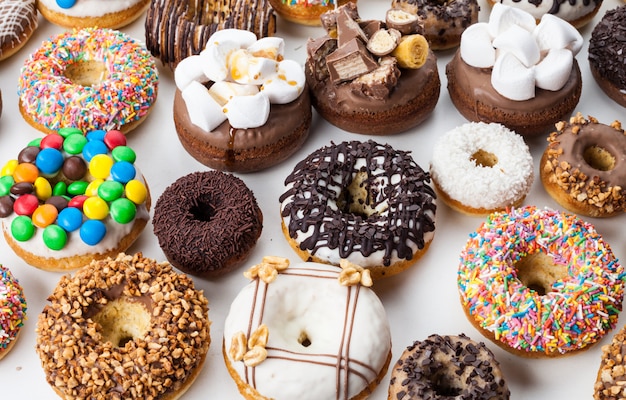 Close up of a selection of colorful donuts.