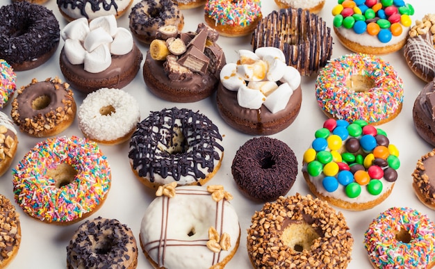 Close up of a selection of colorful donuts.