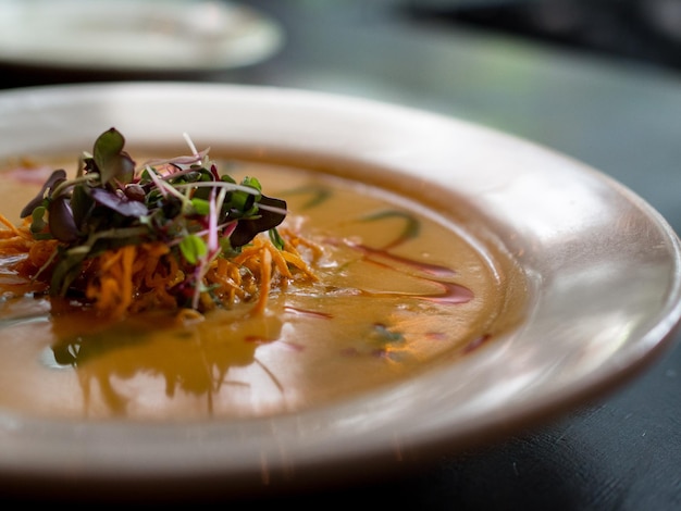 Close-up of served food in plate on table