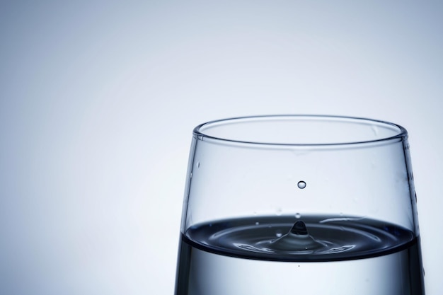 Close-up shot of pouring water into a glass