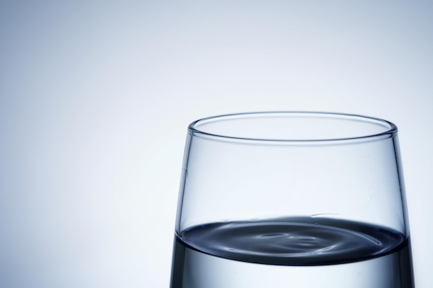 Close-up shot of pouring water into a glass