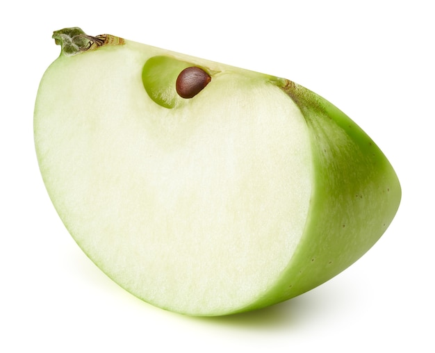 Close up shot of sliced green apple isolated on white