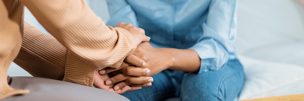 Photo close up shot of supportive and comforting hands for crucial empathy