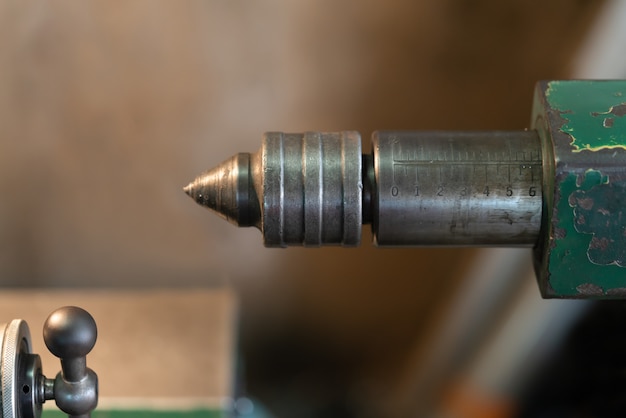 close up shot. Turning high precision automotive part by cnc lathe.