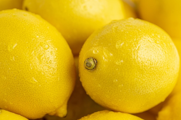 Close up shot of yellow lemons background