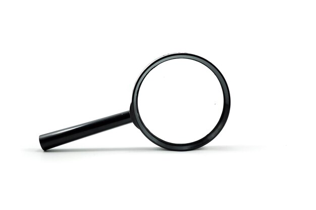 Close up single magnifying glass isolated on a white