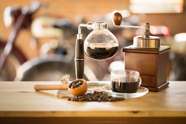 close up of siphon vacuum coffee maker at shop.