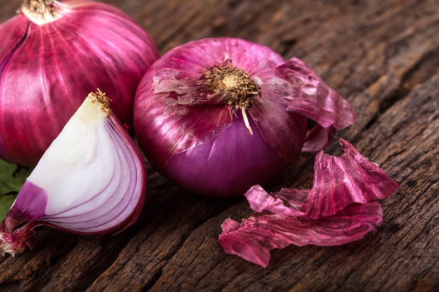 Close up of the  sliced red onion and whole bulb onion 