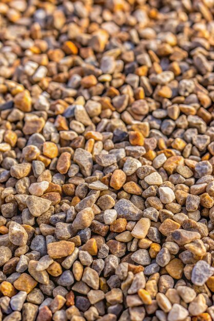 Close up of small gravel construction aggregate material stone usually for crane hardscape supply texture background