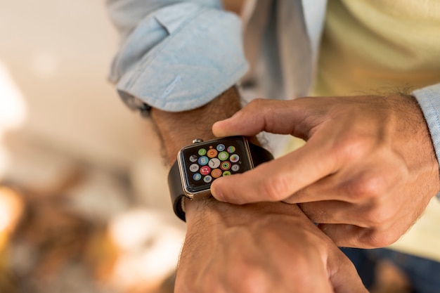 Close-up smartwatch on man wrist