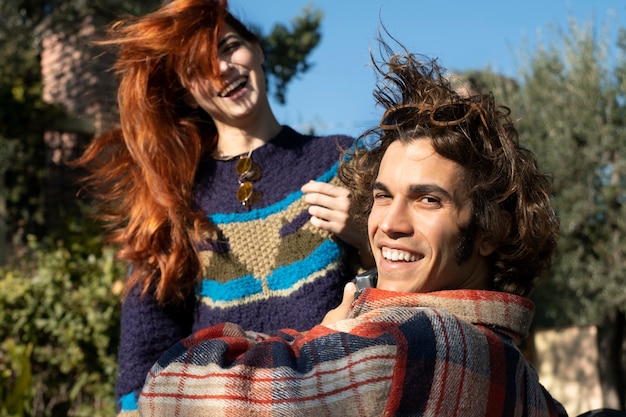 Close up smiley couple in nature