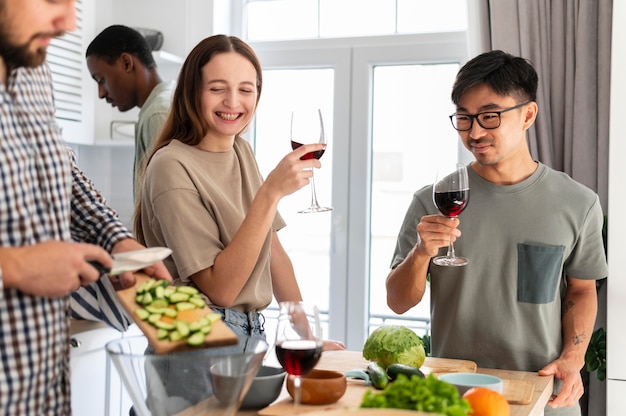 Close up smiley people with wine