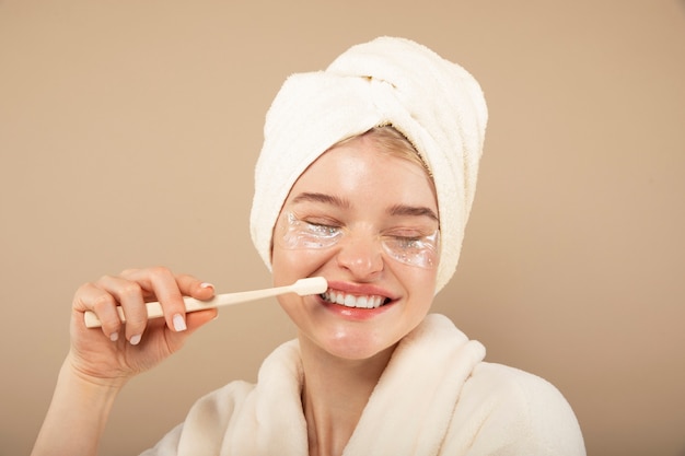 Close up smiley woman with brush