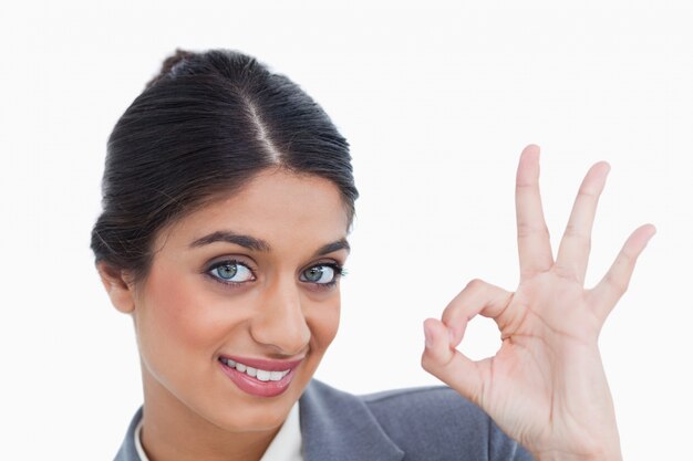 Close up of smiling female entrepreneur giving her approval