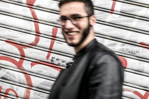 Photo close-up of smiling man by shutter