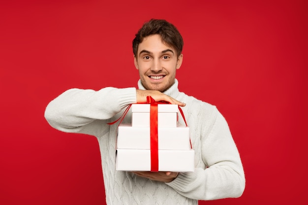 Close up on smiling man in knitted sweater isolated