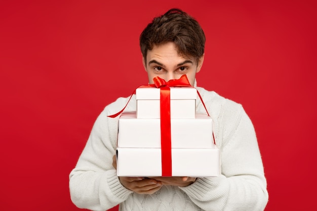 Close up on smiling man in knitted sweater isolated