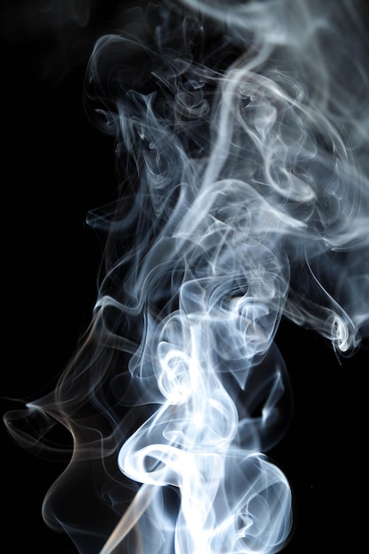 Close-up of smoke against black background