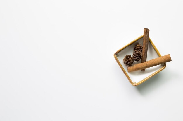 Photo close-up of spice in bowl on white background