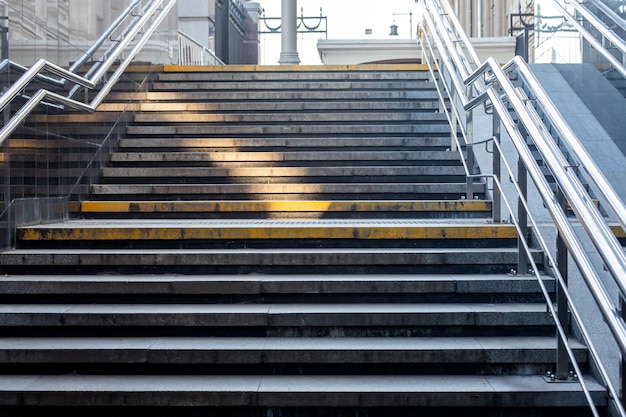 Close up stairs from underground upward, stairway steps. Perspective and high contrast in the monochromatic matte.