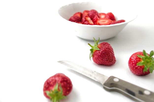 Close-up of strawberries on white background