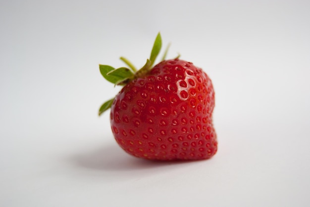 Close-up of strawberry against white background