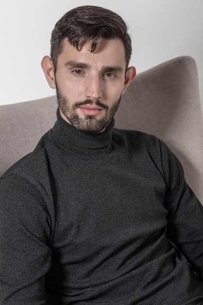 Close up studio portrait of an attractive caucasian man with the beard