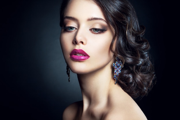 Close-up studio portrait of beautiful woman.