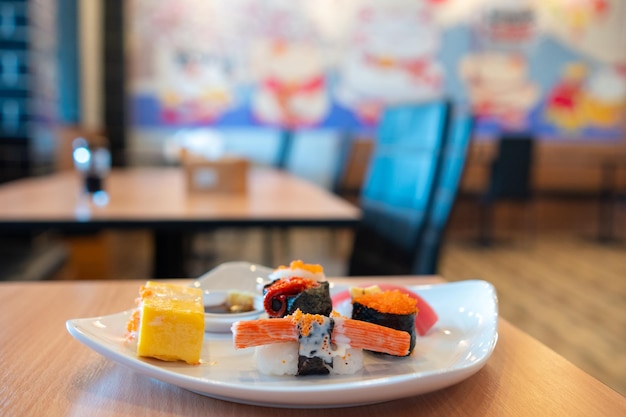 Close-up of sushi served on table