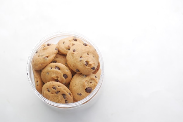 Close up of sweet cookies in a bowl on white background