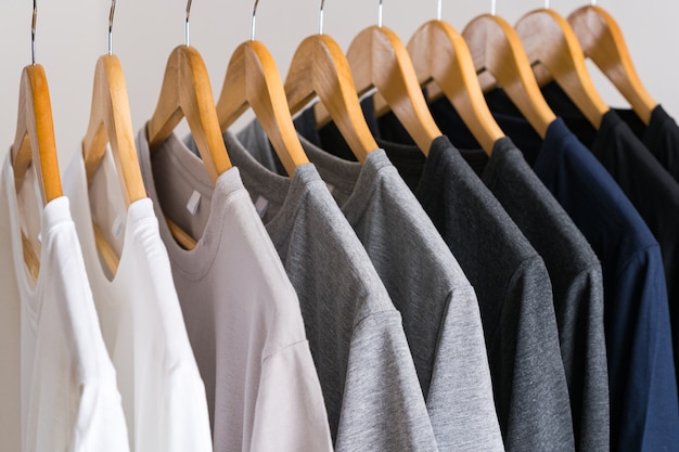 Close up of T-shirts on hangers