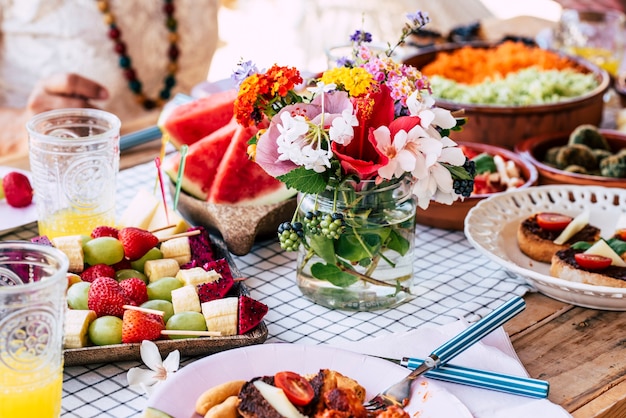 Close up of table full of seasonal fruits and vegetables for a healthy lifestyle and diet nutrition concept