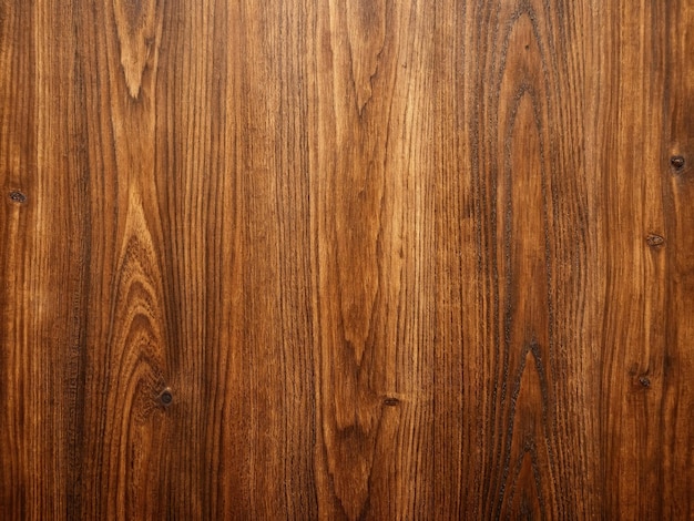 a close up of a table with a brown wood surface