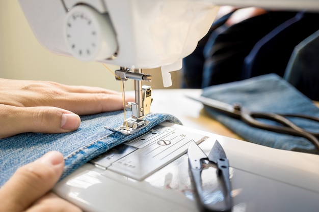 Close up of tailor's hand working 