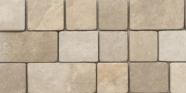 A close up of a tan brick with a white background