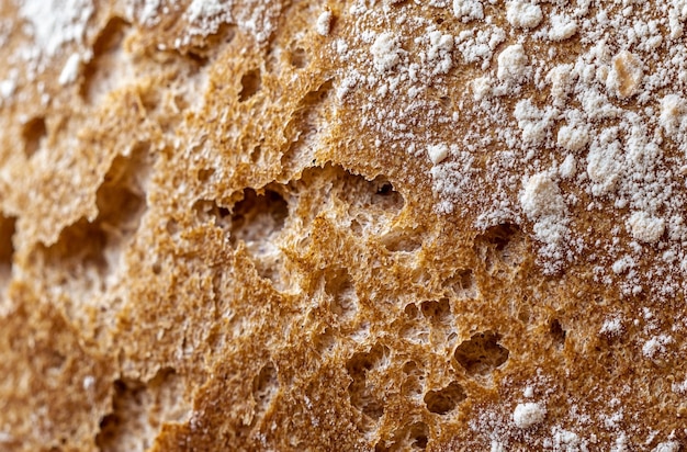 close up of the texture and coloration inside freshly baked sweet whole wheat bread