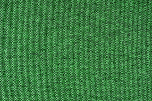 Close up texture of green coarse weave upholstery fabric Decorative textile background