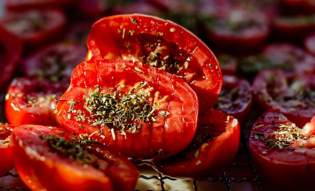 A close up of a tomato on a wire rack