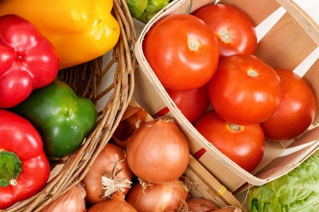 Close up of tomatoes, peppers and onions