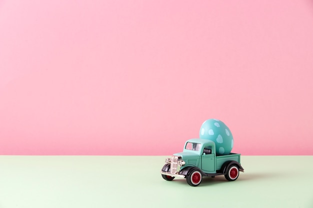 Close up on toy car with easter eggs