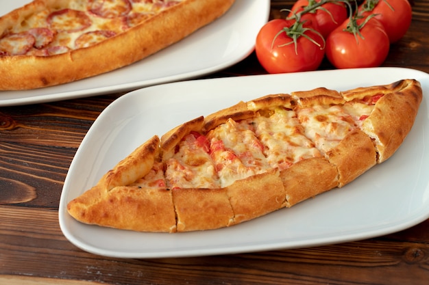 Close up of turkish pide bread on wooden table